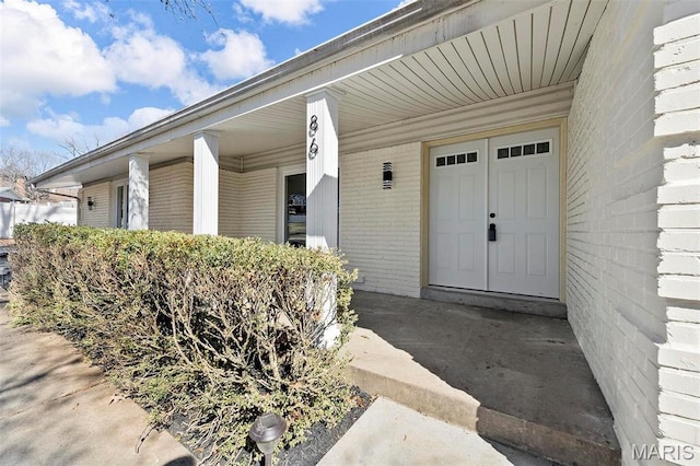 86 Heather View Dr, Chesterfield, MO 63017 - view of exterior entry with brick siding and a porch