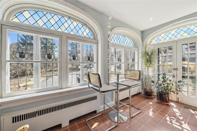 364 Mission Ct, Saint Louis, MO 63130 - sunroom / solarium featuring french doors and radiator heating unit