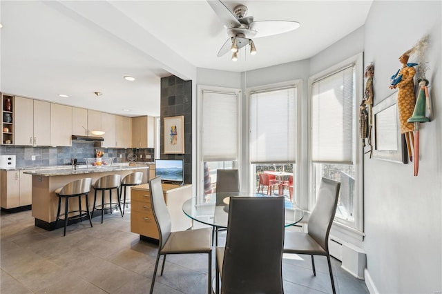 364 Mission Ct, Saint Louis, MO 63130 - dining area featuring plenty of natural light, ceiling fan, and light tile patterned flooring