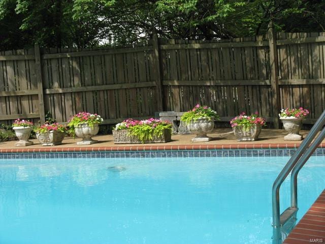 364 Mission Ct, Saint Louis, MO 63130 - view of swimming pool with fence