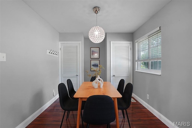 438 Rockview Dr, Saint Louis, MO 63129 - dining space with dark wood-style floors and a chandelier