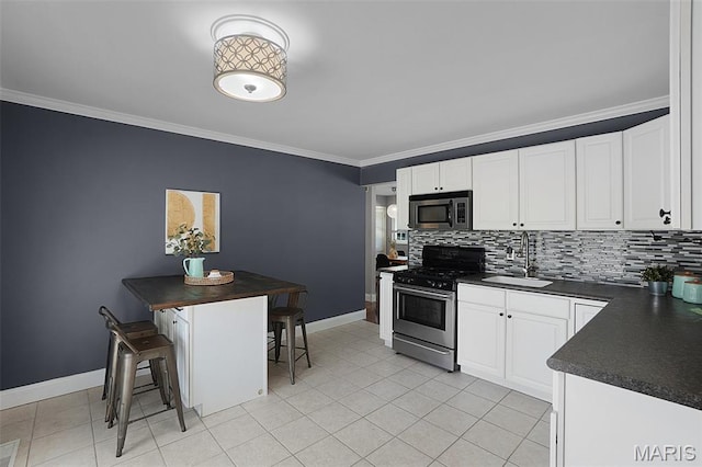 438 Rockview Dr, Saint Louis, MO 63129 - kitchen with stainless steel appliances, dark countertops, ornamental molding, backsplash, and white cabinetry