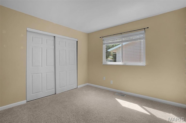 438 Rockview Dr, Saint Louis, MO 63129 - unfurnished bedroom featuring carpet and a closet