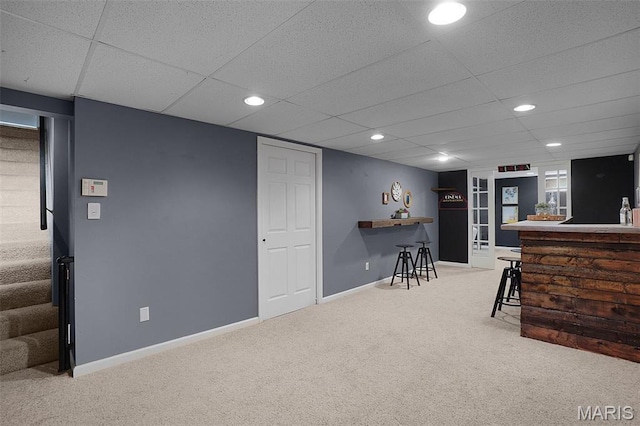 438 Rockview Dr, Saint Louis, MO 63129 - interior space with carpet, a dry bar, stairs, and recessed lighting
