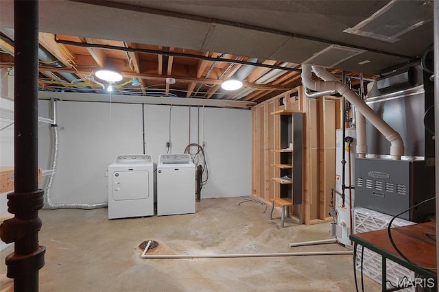 438 Rockview Dr, Saint Louis, MO 63129 - unfinished below grade area featuring washer and dryer and heating unit