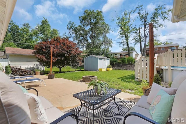 438 Rockview Dr, Saint Louis, MO 63129 - view of patio with an outdoor living space with a fire pit and a storage unit