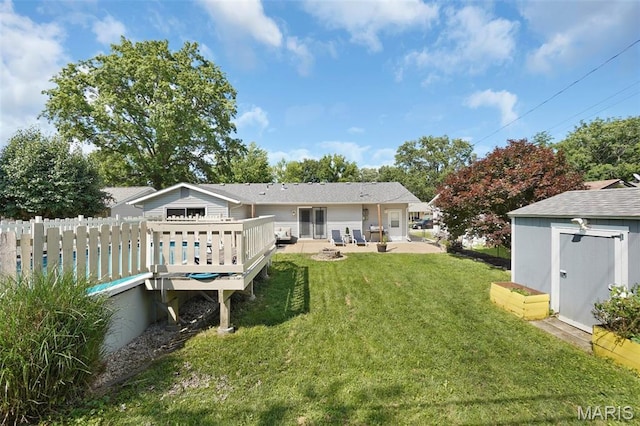 438 Rockview Dr, Saint Louis, MO 63129 - back of property featuring a storage shed, a patio, and a wooden deck