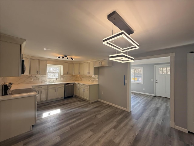 6043 Parkedge Dr, House Springs, MO 63051 - kitchen with stainless steel appliances, a sink, plenty of natural light, and backsplash
