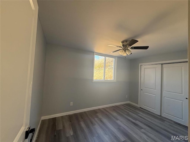 6043 Parkedge Dr, House Springs, MO 63051 - unfurnished bedroom with dark wood-style floors, a closet, and a ceiling fan