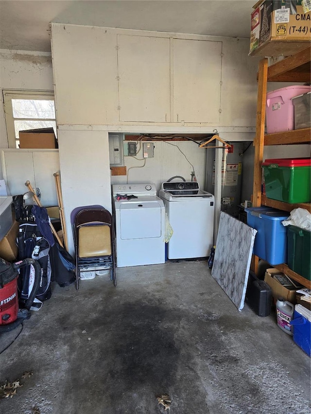 garage featuring separate washer and dryer and gas water heater