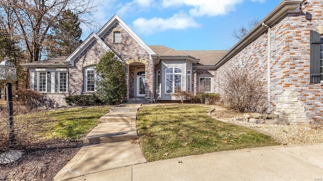 view of front of home with a front yard