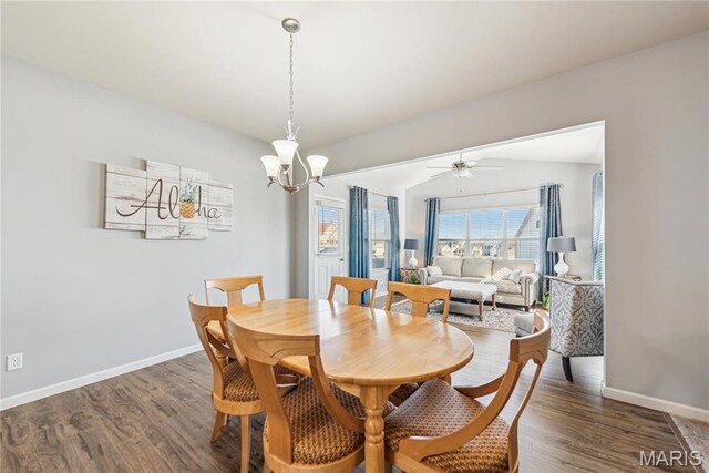 102 Carlton Point Dr, Wentzville, MO 63385 - dining area featuring wood finished floors, a chandelier, and ceiling fan