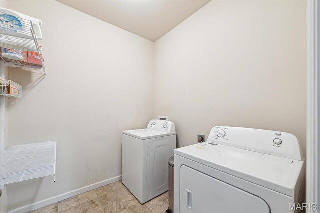 102 Carlton Point Dr, Wentzville, MO 63385 - laundry area with separate washer and dryer and baseboards