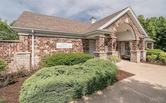 102 Carlton Point Dr, Wentzville, MO 63385 - view of front of house with brick siding and roof with shingles