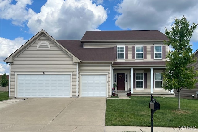 102 Carlton Point Dr, Wentzville, MO 63385 - view of front of house featuring driveway, a front yard, covered porch, and a garage