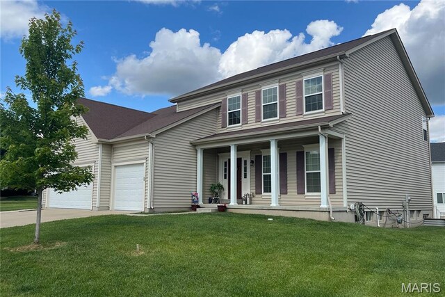 102 Carlton Point Dr, Wentzville, MO 63385 - traditional-style house with covered porch, driveway, an attached garage, and a front lawn