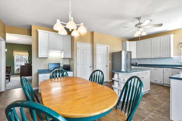 775 Vista Glen Ct, Eureka, MO 63025 - dining space featuring a ceiling fan and a chandelier