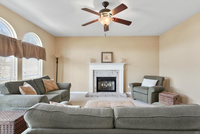 775 Vista Glen Ct, Eureka, MO 63025 - living room featuring a ceiling fan, carpet flooring, and a glass covered fireplace