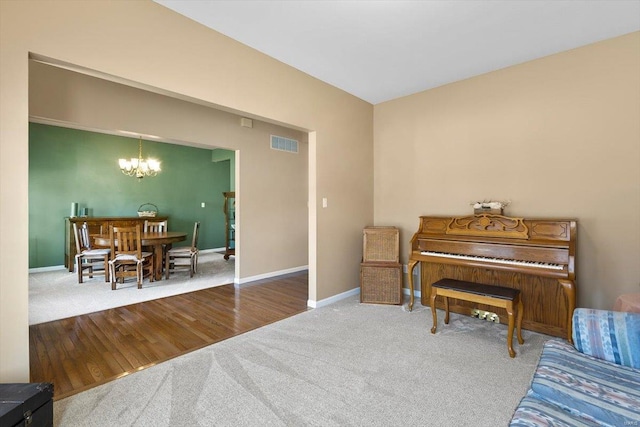 775 Vista Glen Ct, Eureka, MO 63025 - living area with carpet flooring, a chandelier, and baseboards