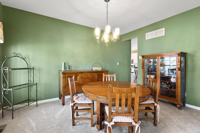 775 Vista Glen Ct, Eureka, MO 63025 - dining area featuring light colored carpet, a chandelier, and baseboards
