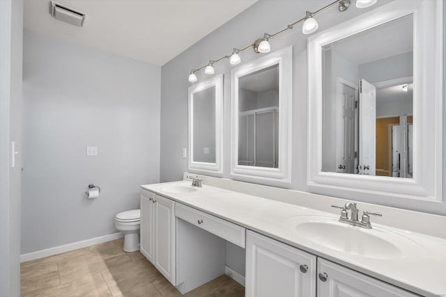 775 Vista Glen Ct, Eureka, MO 63025 - full bathroom featuring double vanity, toilet, baseboards, and tile patterned flooring