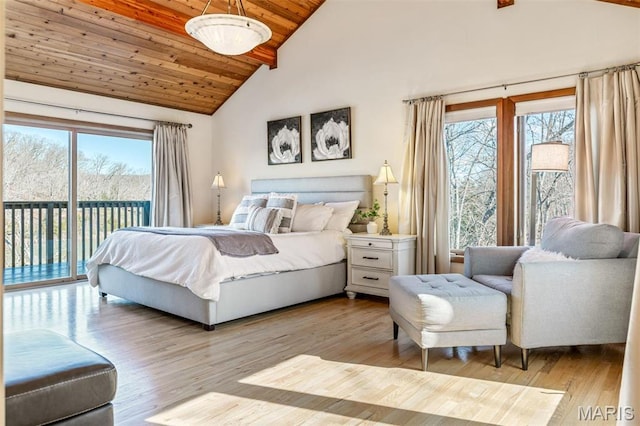 2208 N Konstanz Dr, Innsbrook, MO 63390 - bedroom featuring access to exterior, wooden ceiling, light wood finished floors, beam ceiling, and high vaulted ceiling