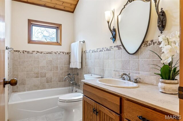 2208 N Konstanz Dr, Innsbrook, MO 63390 - full bath with tile patterned floors, a bath, vanity, toilet, and tile walls