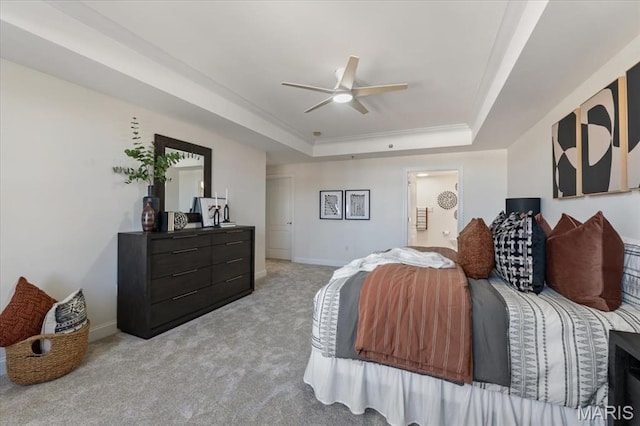 842 N New Ballas Ct Unit 303, Saint Louis, MO 63141 - bedroom with a tray ceiling, light carpet, baseboards, ornamental molding, and ceiling fan