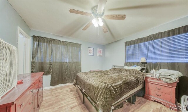611 N Charles Ave, St James, MO 65559 - bedroom featuring light wood-style flooring and ceiling fan