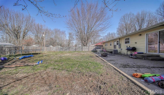 611 N Charles Ave, St James, MO 65559 - view of yard featuring a fire pit and a patio area