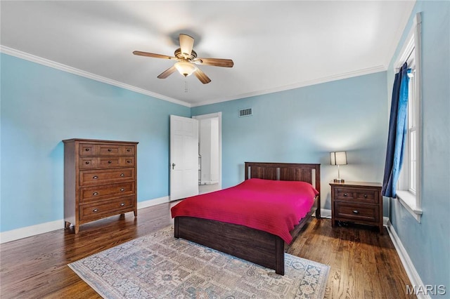 bedroom with wood finished floors, baseboards, crown molding, and a ceiling fan