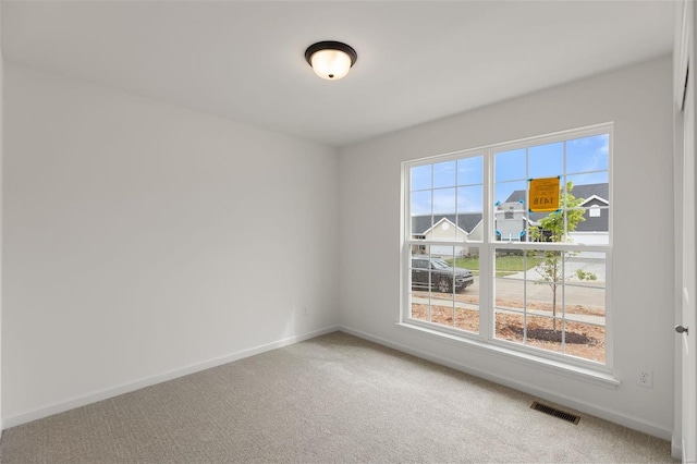 1028 Red Fox Dr, Eureka, MO 63025 - empty room with light carpet and baseboards