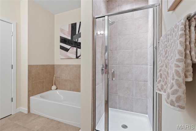 9 N Euclid Ave Unit 508, Saint Louis, MO 63108 - full bath with a shower stall, a bath, and tile patterned floors