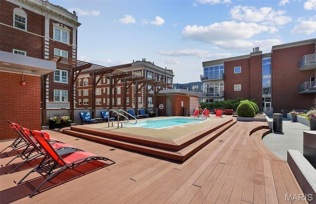 9 N Euclid Ave Unit 508, Saint Louis, MO 63108 - view of pool featuring a jacuzzi and a deck