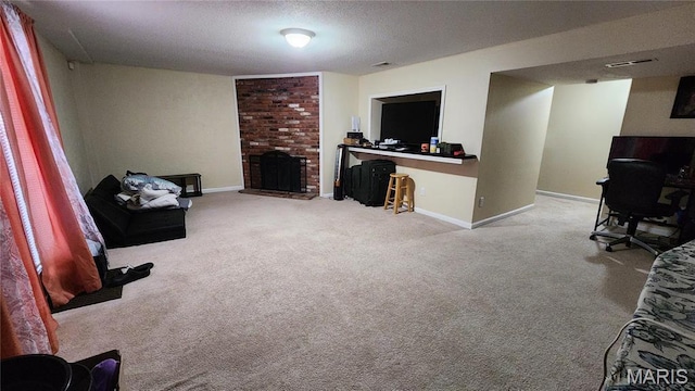 1147 Rue La Chelle Unit 1147, Creve Coeur, MO 63141 - living area featuring carpet flooring, a fireplace, baseboards, and a textured ceiling