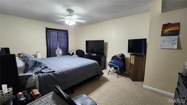 1147 Rue La Chelle Unit 1147, Creve Coeur, MO 63141 - bedroom with light carpet, baseboards, and ceiling fan