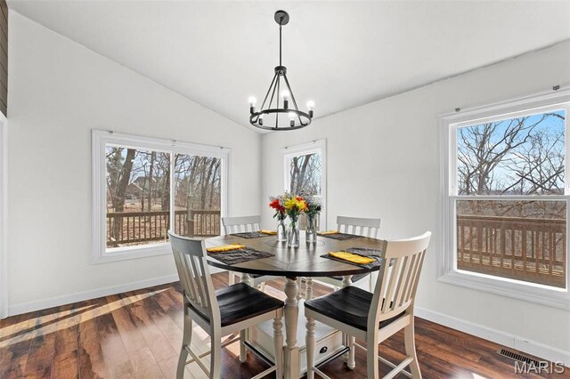 19120 Hawk Mountain Rd, Wildwood, MO 63038 - dining space with a chandelier, baseboards, dark wood-style flooring, and lofted ceiling