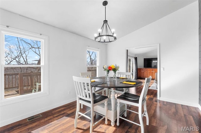 19120 Hawk Mountain Rd, Wildwood, MO 63038 - dining space with a chandelier, baseboards, lofted ceiling, and wood finished floors