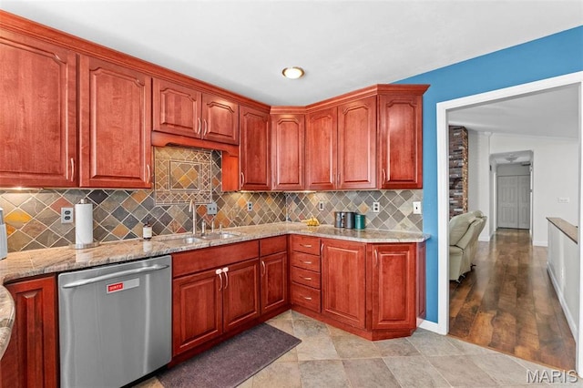 19120 Hawk Mountain Rd, Wildwood, MO 63038 - kitchen featuring stainless steel dishwasher, a sink, light stone countertops, tasteful backsplash, and baseboards