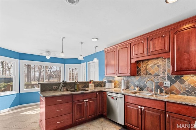 19120 Hawk Mountain Rd, Wildwood, MO 63038 - kitchen featuring stainless steel dishwasher, a sink, backsplash, and light stone counters