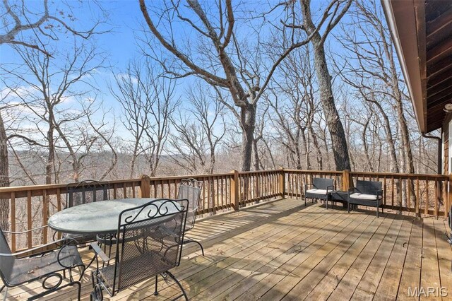 19120 Hawk Mountain Rd, Wildwood, MO 63038 - deck with outdoor dining area
