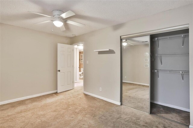 1626 High School Dr, Saint Louis, MO 63144 - unfurnished bedroom with carpet, a closet, a textured ceiling, a ceiling fan, and baseboards