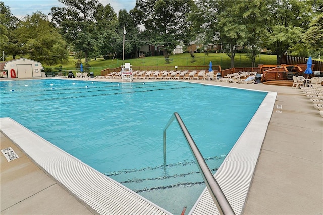 1626 High School Dr, Saint Louis, MO 63144 - community pool with view of scattered trees