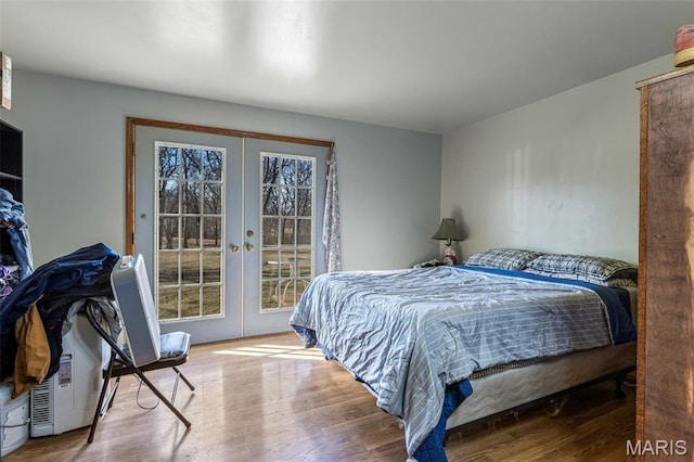 4279 Ee Hwy, Farmington, MO 63640 - bedroom with french doors, wood finished floors, and access to exterior