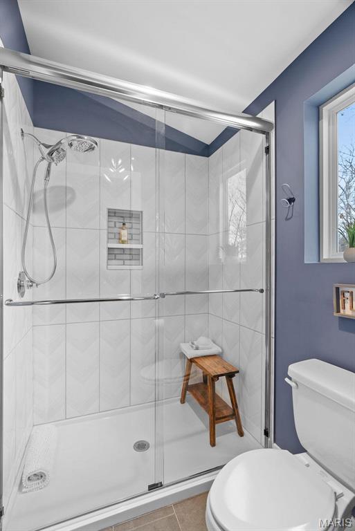 3545 Cappeln Osage Rd, Marthasville, MO 63357 - bathroom featuring toilet, a shower stall, and tile patterned flooring