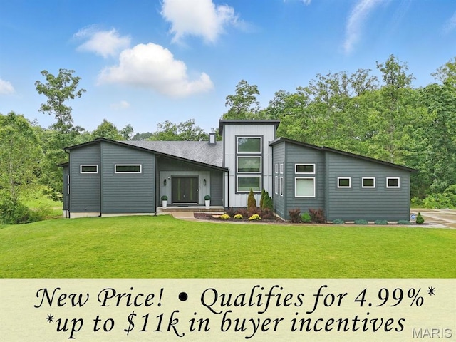 3545 Cappeln Osage Rd, Marthasville, MO 63357 - rear view of house with a yard