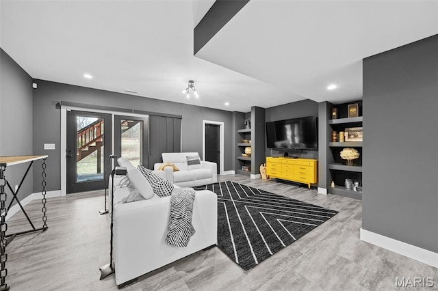 3545 Cappeln Osage Rd, Marthasville, MO 63357 - living area with built in features, wood finished floors, and recessed lighting
