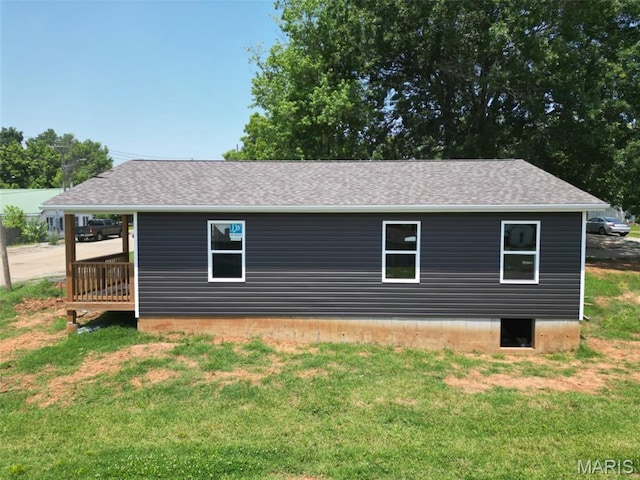 507 Villar St, Fredericktown, MO 63645 - view of home's exterior featuring a lawn and a shingled roof