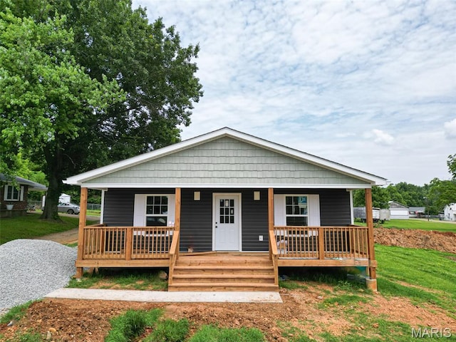 507 Villar St, Fredericktown, MO 63645 - bungalow-style house with covered porch and a front yard