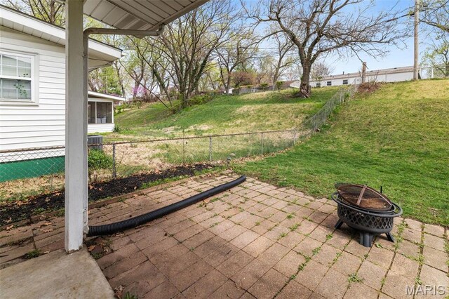 190 Coteau Ln, Florissant, MO 63033 - view of patio with an outdoor fire pit